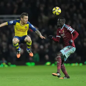 Clash at the Boleyn: Debuchy vs. Kouyate in the West Ham United vs. Arsenal Premier League Battle