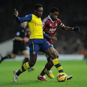 Clash at Boleyn Ground: Welbeck vs. Song in the 2014-15 West Ham United vs. Arsenal Premier League Battle