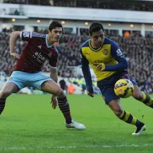 Clash at the Boleyn: Sanchez vs. Tomkins in the Premier League Battle between West Ham and Arsenal
