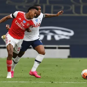 Clash in the Capital: Intense Moment between Joe Willock and Steven Bergwijn in the Premier League Battle between Tottenham and Arsenal (2019-20)