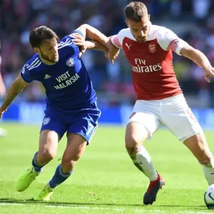 Clash at Cardiff: Ramsey vs. Arter in Premier League Battle