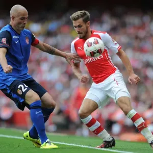 Clash of Champions: Ramsey vs. Raggi - Arsenal's Ramsey Goes Head-to-Head with AS Monaco's Raggi in Thrilling Emirates Cup Encounter