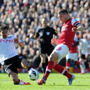 Clash at Craven Cottage: Lukas Podolski vs. Kieran Richardson Clash at Craven Cottage: Lukas Podolski vs. Kieran Richardson