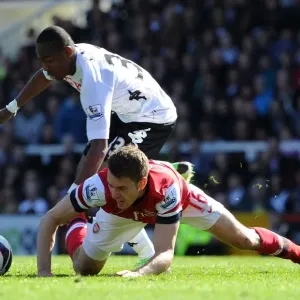 Clash at Craven Cottage: Ramsey vs. Enoh, April 2013 - Fulham vs. Arsenal, Premier League Clash at Craven Cottage: Ramsey vs. Enoh, April 2013 - Fulham vs. Arsenal, Premier League