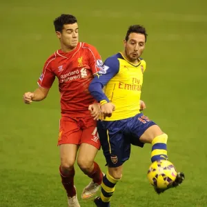 Clash of the Creatives: Cazorla vs. Coutinho - Premier League Showdown (2014), Arsenal's Santi Cazorla vs. Liverpool's Philippe Coutinho in Action Clash of the Creatives: Cazorla vs. Coutinho - Premier League Showdown (2014), Arsenal's Santi Cazorla vs. Liverpool's Philippe Coutinho in Action