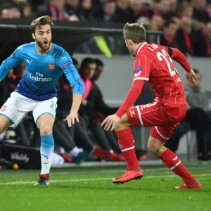Clash of Defenders: Chambers vs. Horn in Arsenal's Europa League Battle against 1. FC Koln Clash of Defenders: Chambers vs. Horn in Arsenal's Europa League Battle against 1. FC Koln