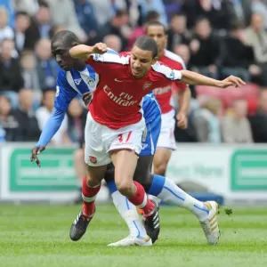 Clash at DW Stadium: Mohamed Diame Outshines Craig Eastmond as Wigan Athletic Edge Arsenal 3-2 in FA Premier League
