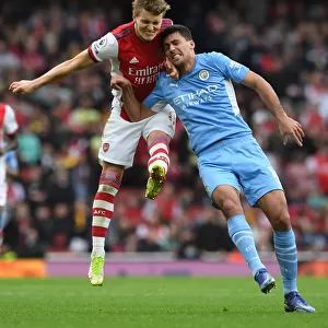 Clash at the Emirates: Arsenal vs Manchester City - A Heading Battle Between Odegaard and Rodri