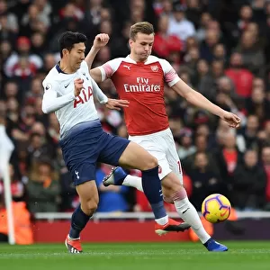 Clash at the Emirates: Holding vs. Son in the Arsenal vs. Tottenham Premier League Battle