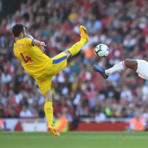 Clash at the Emirates: Lacazette vs. Milivojevic