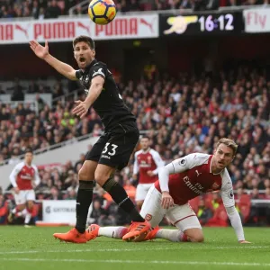 Clash at the Emirates: Ramsey vs. Fernandez in Arsenal's Battle Against Swansea City Clash at the Emirates: Ramsey vs. Fernandez in Arsenal's Battle Against Swansea City