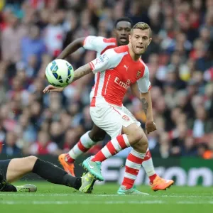 Clash at Emirates: Wilshere vs Dawson in Arsenal's Battle against Hull City (2014-15) Clash at Emirates: Wilshere vs Dawson in Arsenal's Battle against Hull City (2014-15)