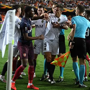 Clash of Giants: Ainsley Maitland-Niles vs. Gabriel in the Intense UEFA Europa League Semi-Final Showdown between Valencia and Arsenal