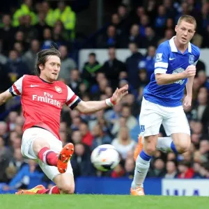 Clash at Goodison Park: Rosicky vs McCarthy in Premier League Battle