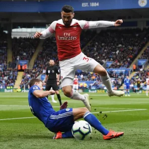 Clash at The King Power: Evans vs. Kolasinac - A Premier League Battle Clash at The King Power: Evans vs. Kolasinac - A Premier League Battle