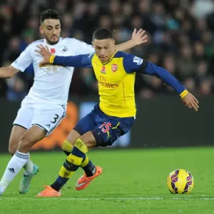 Clash at Liberty: Oxlade-Chamberlain vs. Taylor - Swansea vs. Arsenal, Premier League 2014-15 Clash at Liberty: Oxlade-Chamberlain vs. Taylor - Swansea vs. Arsenal, Premier League 2014-15