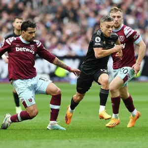 Clash at London Stadium: Arsenal's Trossard Faces Off Against West Ham's Paqueta and Bowen