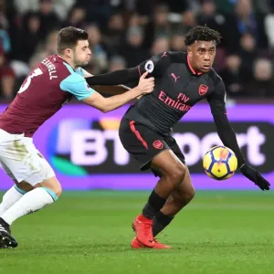 Clash at London Stadium: Iwobi vs Cresswell in the Premier League Battle between West Ham and Arsenal Clash at London Stadium: Iwobi vs Cresswell in the Premier League Battle between West Ham and Arsenal