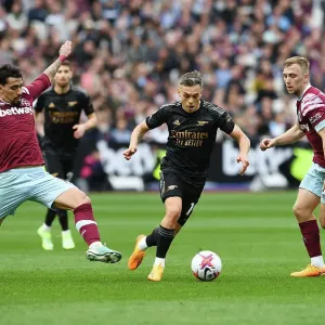 Clash at London Stadium: Trossard Faces Off Against Paqueta and Bowen