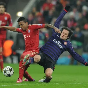 Clash of Midfield Giants: Rosicky vs. Gustavo in Bayern Munich vs. Arsenal UEFA Champions League Showdown