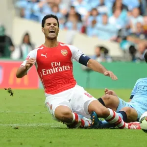 Clash of Midfield Maestros: Arteta vs. Silva - Arsenal vs. Manchester City, FA Community Shield 2014