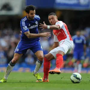 Clash of the Midfield Maestros: Oxlade-Chamberlain vs. Fabregas - A Premier League Battle