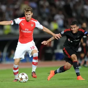Clash of Midfield Titans: Aaron Ramsey vs. Ramon Motta in Arsenal's UEFA Champions League Showdown against Besiktas Clash of Midfield Titans: Aaron Ramsey vs. Ramon Motta in Arsenal's UEFA Champions League Showdown against Besiktas