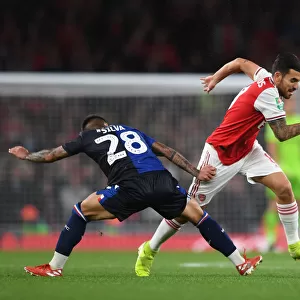 Clash of Midfield Titans: Ceballos vs Silva - Arsenal's Carabao Cup Showdown