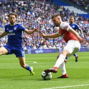 Clash of Midfield Titans: Ramsey vs. Arter in the Intense Cardiff Derby, Premier League 2018-19