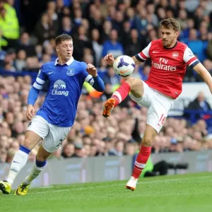 Clash of Midfield Titans: Ramsey vs. Barkley - A Premier League Battle at Goodison Park, 2013/14