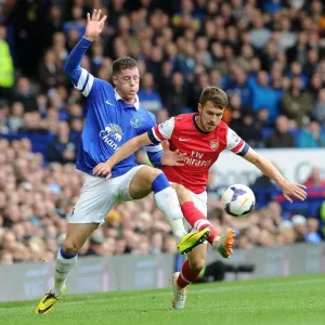 Clash of Midfield Titans: Ramsey vs Barkley in Everton vs Arsenal, Premier League 2013/14