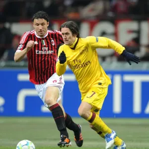 Clash of Midfield Titans: Rosicky vs. van Bommel - AC Milan vs. Arsenal FC, UEFA Champions League 2012 Clash of Midfield Titans: Rosicky vs. van Bommel - AC Milan vs. Arsenal FC, UEFA Champions League 2012