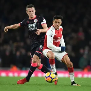 Clash of Midfield Titans: Sanchez vs Hogg - Arsenal's Premier League Showdown Clash of Midfield Titans: Sanchez vs Hogg - Arsenal's Premier League Showdown