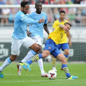 Clash of Midfield Titans: Wilshere vs. Toure & Lescott - Arsenal vs. Manchester City Pre-Season 2013-14 Clash of Midfield Titans: Wilshere vs. Toure & Lescott - Arsenal vs. Manchester City Pre-Season 2013-14