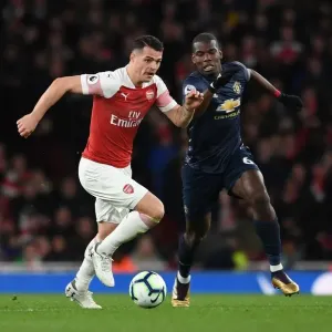 Clash of Midfield Titans: Xhaka vs. Pogba - Arsenal vs. Manchester United, Premier League