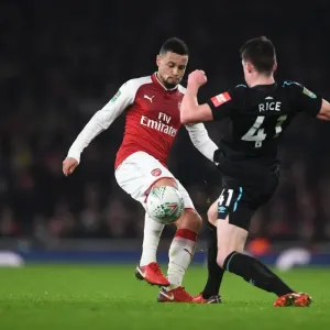 Clash of Midfielders: Coquelin vs. Rice in Carabao Cup Showdown Clash of Midfielders: Coquelin vs. Rice in Carabao Cup Showdown
