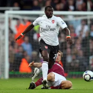 Clash of the Midfielders: Eboue vs. Noble in the Intense 2-2 Battle at Upton Park, Premier League 2009 Clash of the Midfielders: Eboue vs. Noble in the Intense 2-2 Battle at Upton Park, Premier League 2009