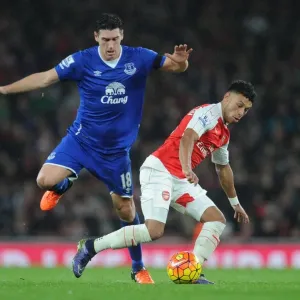 Clash of the Midfielders: Oxlade-Chamberlain vs. Barry in Intense Arsenal vs. Everton Battle Clash of the Midfielders: Oxlade-Chamberlain vs. Barry in Intense Arsenal vs. Everton Battle