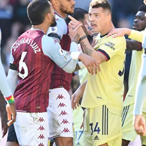 Clash of Midfielders: Xhaka vs. Douglas Luiz in Aston Villa vs. Arsenal Premier League Match
