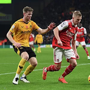 Clash at Molineux: Arsenal's Zinchenko Faces Off Against Wolves Collins