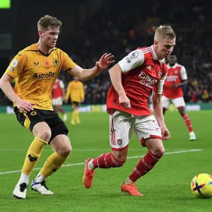 Clash at Molineux: Arsenal's Zinchenko Faces Off Against Wolves Collins