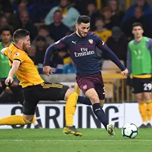 Clash at Molineux: Wolverhampton Wanderers vs. Arsenal FC, Premier League 2018-19 - Sead Kolasinac Faces Off Against Matt Doherty