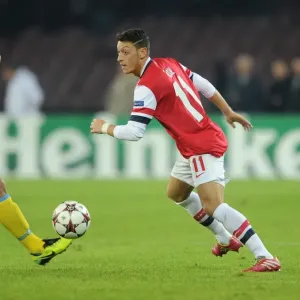 Clash in Naples: Ozil vs. Behrami - Napoli v Arsenal, UEFA Champions League, 2013 Clash in Naples: Ozil vs. Behrami - Napoli v Arsenal, UEFA Champions League, 2013