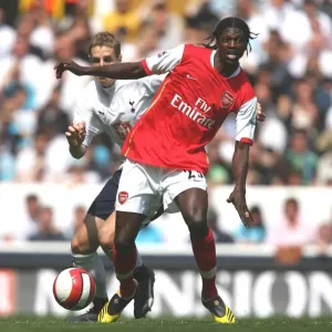 Clash of Rivals: Adebayor vs. Dawson in the Intense 2006-07 FA Premiership Rivalry Match Between Tottenham and Arsenal Clash of Rivals: Adebayor vs. Dawson in the Intense 2006-07 FA Premiership Rivalry Match Between Tottenham and Arsenal