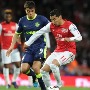 Clash of Santos: Arsenal's Andre Faces Wigan's Franco in Premier League Showdown