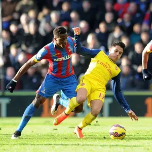 Clash at Selhurst Park: Sanchez Fouls Zaha in Intense Crystal Palace vs. Arsenal Match