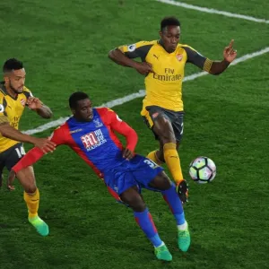 Clash at Selhurst Park: Walcott and Welbeck Go Head-to-Head Against Schlupp