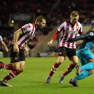Clash at the Stadium of Light: Walcott vs Larsson and Bardsley in the FA Cup Battle between Sunderland and Arsenal