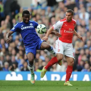 Clash at Stamford Bridge: Podolski vs. Mikel Obi - A Football Battle