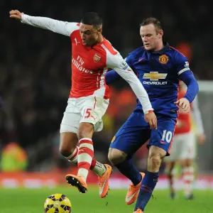Print of Alex Oxlade-Chamberlain vs Wayne Rooney Print of Alex Oxlade-Chamberlain vs Wayne Rooney